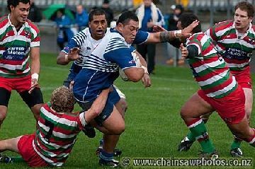 Attractive rugby continues in miserable conditions